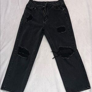 Woman’s wide leg black ripped jeans size L